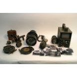 A Spitfire lens plus others to include a Soviet example, field gun lens and other items.