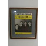 Framed and glazed sheet music of The Beatles song 'I want to hold your hand' with signatures