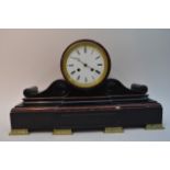 A very large black and red rouge marble clock, wit