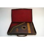 A cased American zither.