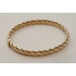 A ladies 9ct gold bracelet.