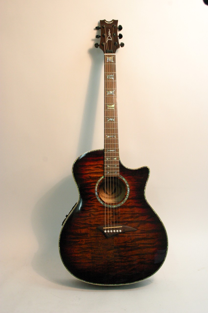 A Dean Exotica semi acoustic guitar with soft padd