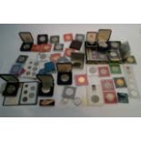 A collection of proof coins and Royal mint sets