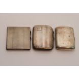 Three silver cigarette cases various designs and h