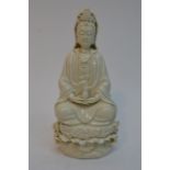 A Chinese Blanc de Chine figure of Guanyin. Approx