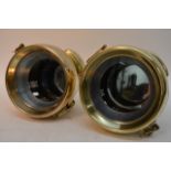 A pair of Edwardian polished brass headlights