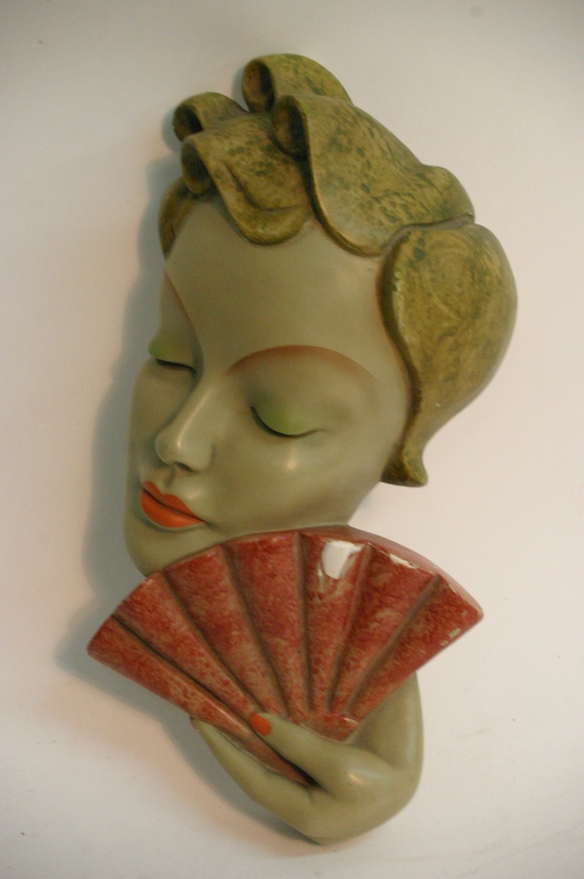 An Art Deco Leonardi plaster wall mask of a stylis