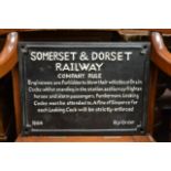 A cast iron Somerset and Dorset railway sign.