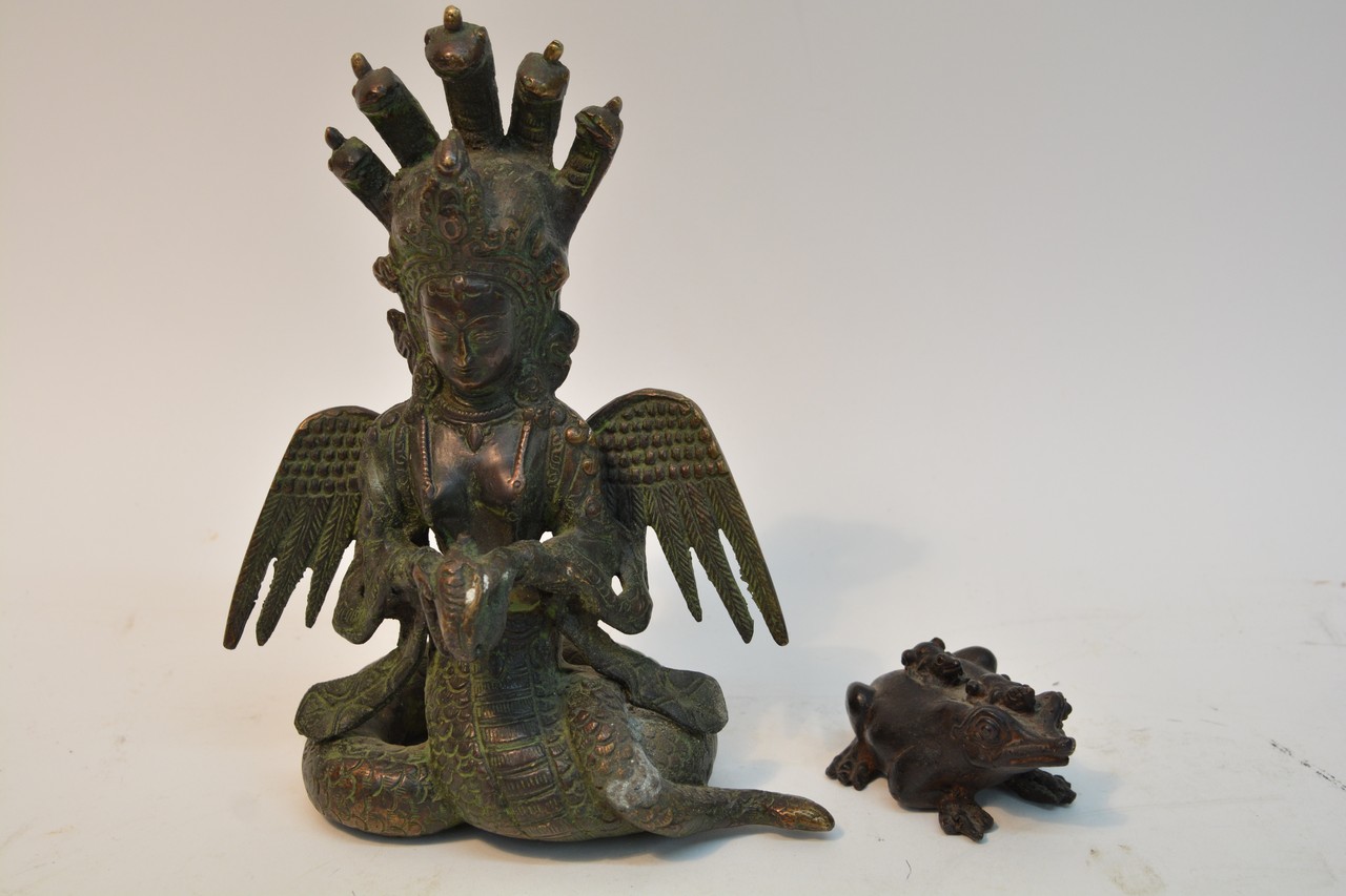 A modern Chinese bronze of a God like figure and a