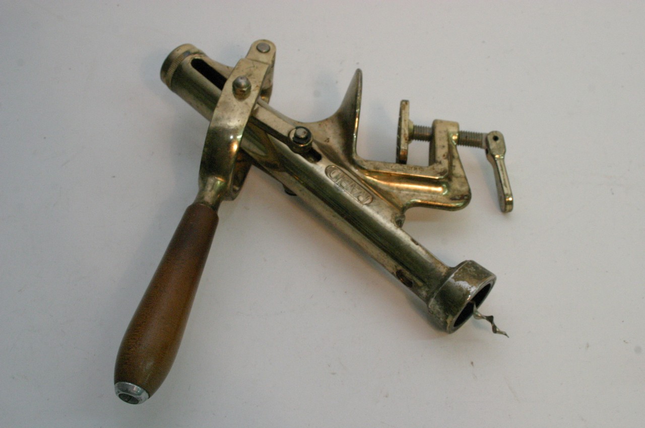 A Swiss made Rapid brass corkscrew.