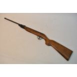 A Jaguar 1.77 Air Rifle with wooden stock.