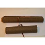 Two rolled oriental scrolls printed on woven fabri