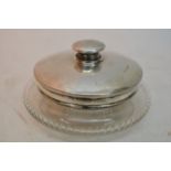 A silver and cut glass powder jar and a perfume bo
