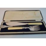 A cased silver mounted set of fish servers and a s