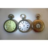 A gold plated pocket watch and two silver pocket w