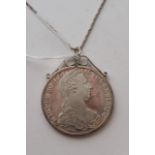 A silver 1780 coin in pendent mount