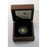 A royal mint gold quarter sovereign 2012 with cert