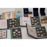 A collection of 5 proof sets and various loose coi