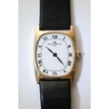 A gold cased Baume & Mercier wristwatch.