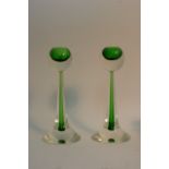 A stylish pair of Murano green cased glass candles