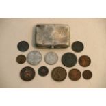 A silver cigarette case and a small collection of