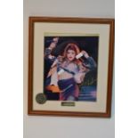 A framed and glazed signed Madonna print with guar