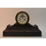 A large black and red rouge marble clock with visi