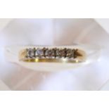 Ladies 18ct yellow gold ring inset with five diamo