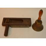 An A.R.P handbell and wooden crow scarer rattle