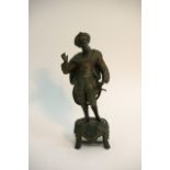 A spelter figure of an Eastern Warrior with sword