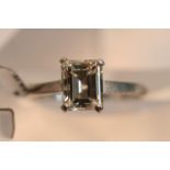 Ladies 18ct white gold ring inset with emerald cut