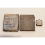 Two silver cigarette cases and a vesta case