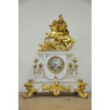 A 19th Century French mantel clock the top surmoun