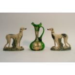 Two Staffordshire type dogs and a green glass jug