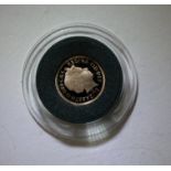 A royal mint gold quarter sovereign 2012 with cert