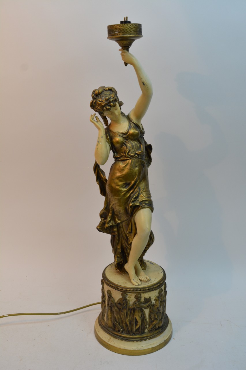 A spelton figure in the form of a classical maiden