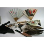 A collection of vintage hand fans.