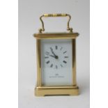 A Matthew Norman brass carriage clock with Roman n