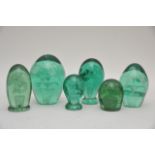 Six Victorian green glass dumps