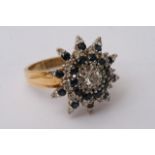 An 18ct yellow gold ring set with a large sapphire