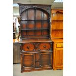 An oak dresser, approx 99cm x 44cm x 195cm.