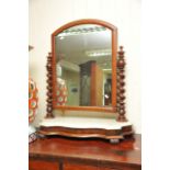 A Victorian mahogany dressing mirror with twist su