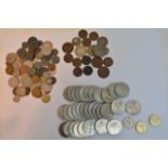 A bag containing various GB and foreign coinage.