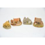 A collection of 30 Lilliput Lane cottages.