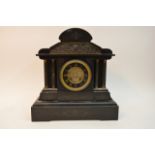 A Victorian slate mantel clock in classical form,
