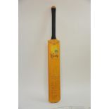 A 1973 cricket bat signed by six counties, England