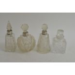 Four silver scent bottles three with silver collar