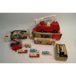 A box of toys consisting of tin plate fire engine,