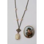 A silver and pearl neclace and an oval porcelain b