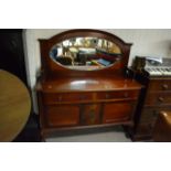 A mahogany mirrored back sideboard